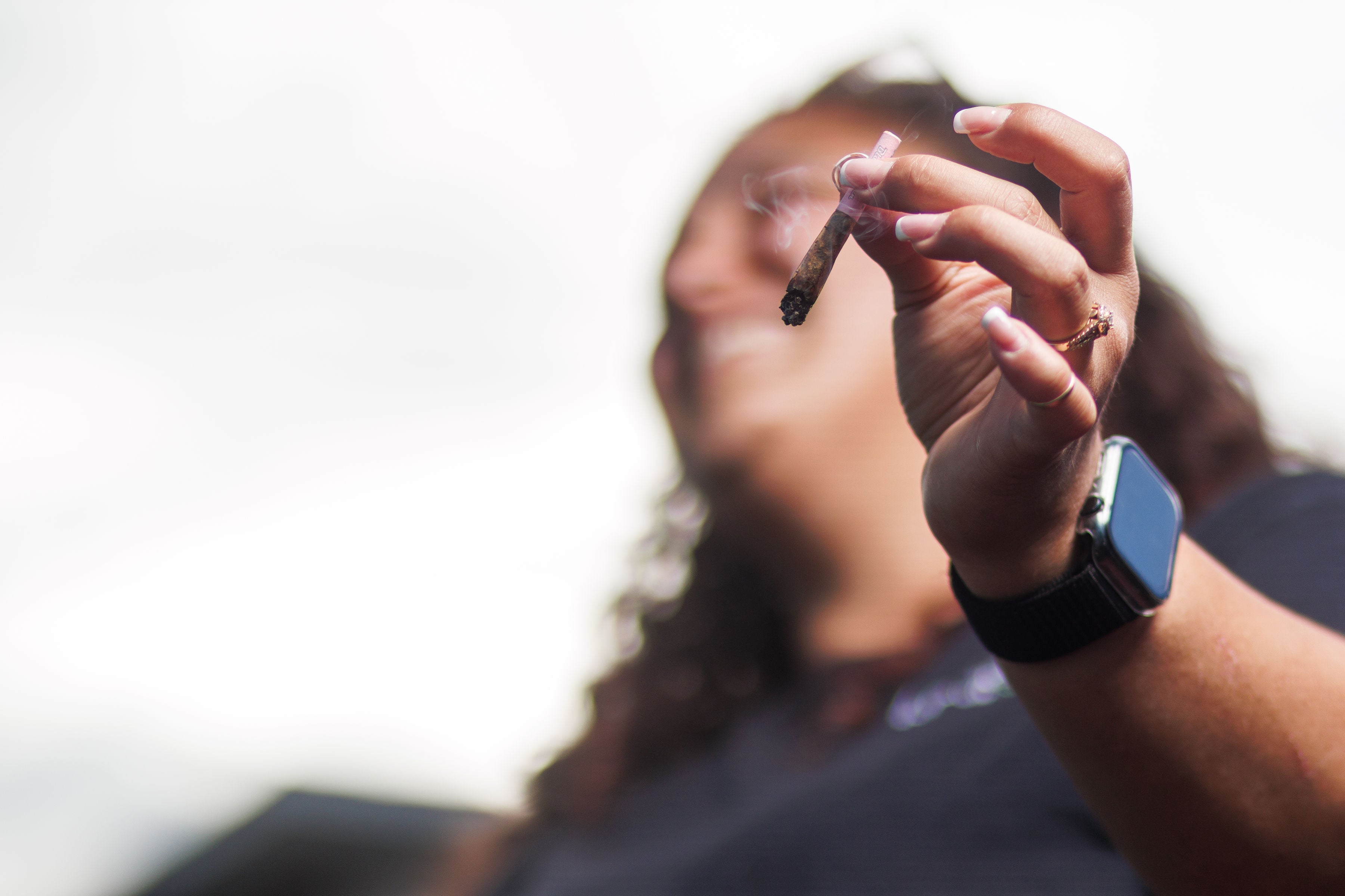 girl holding joint 