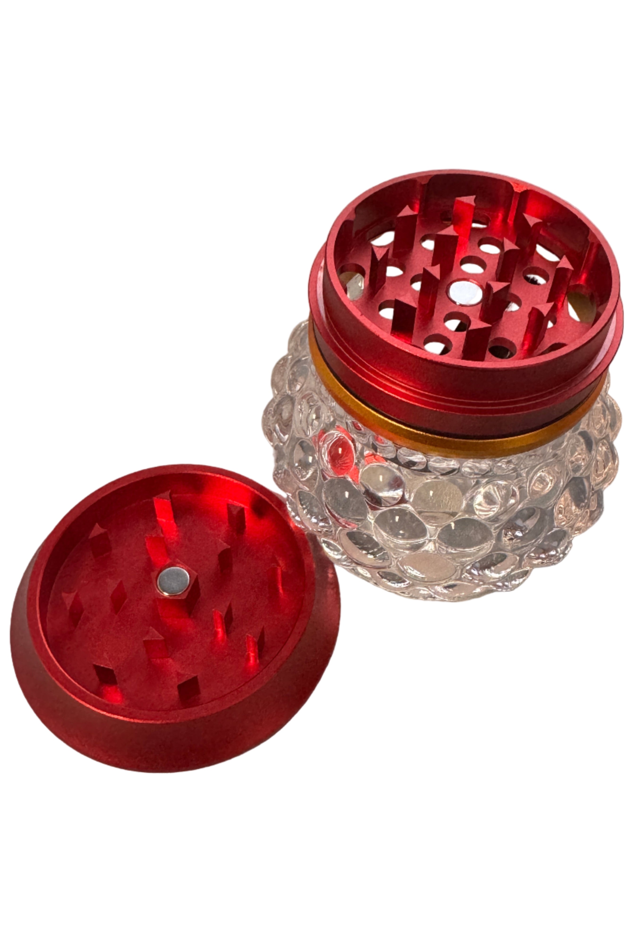 Red metal grinder with glass herb catcher