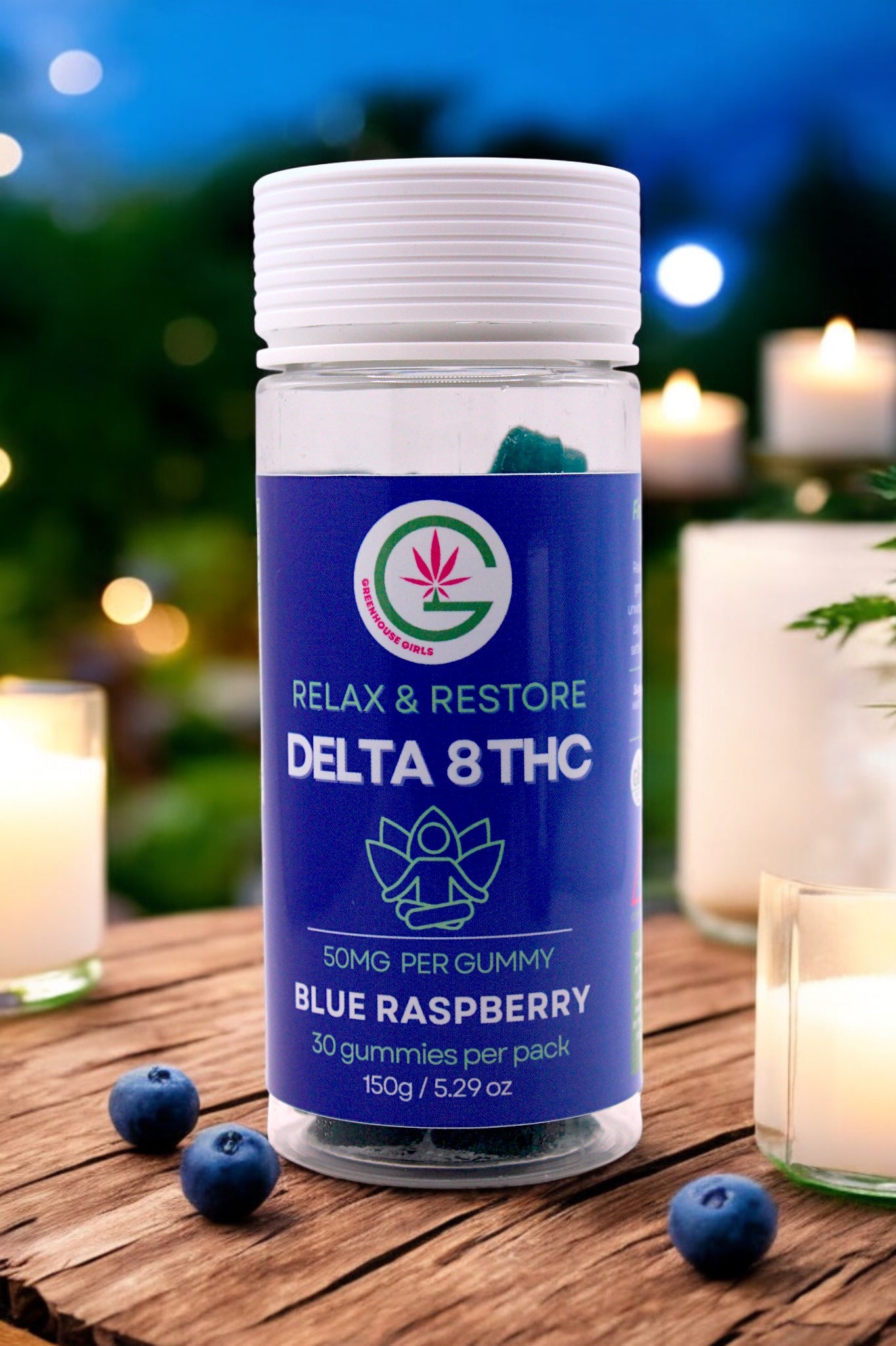 Bottle of Delta 8 THC gummies with a blue label on a wooden surface with candles in the background.