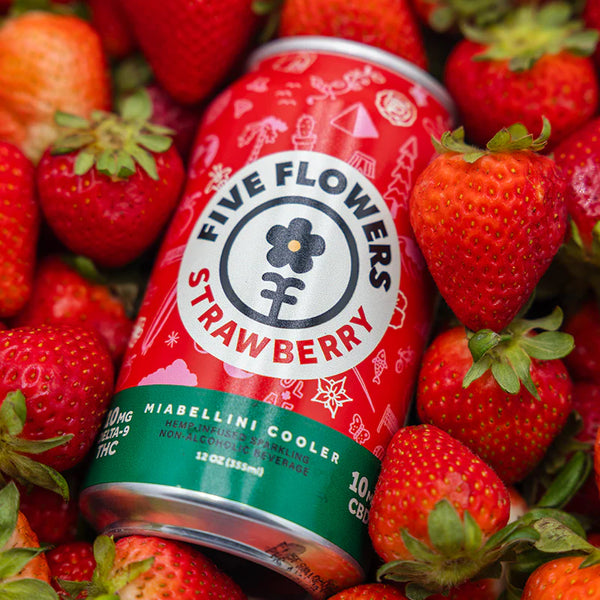 Five Flowers Strawberry can surrounded by strawberries