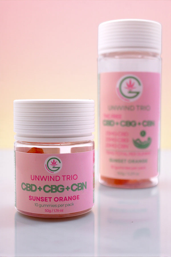 Two containers of Unwind Trio CBD+Cbg+Cbn Sunset Orange on a light background