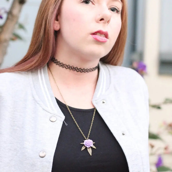 cannabis necklace weed with rose on a women 